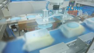 lid applicator machine